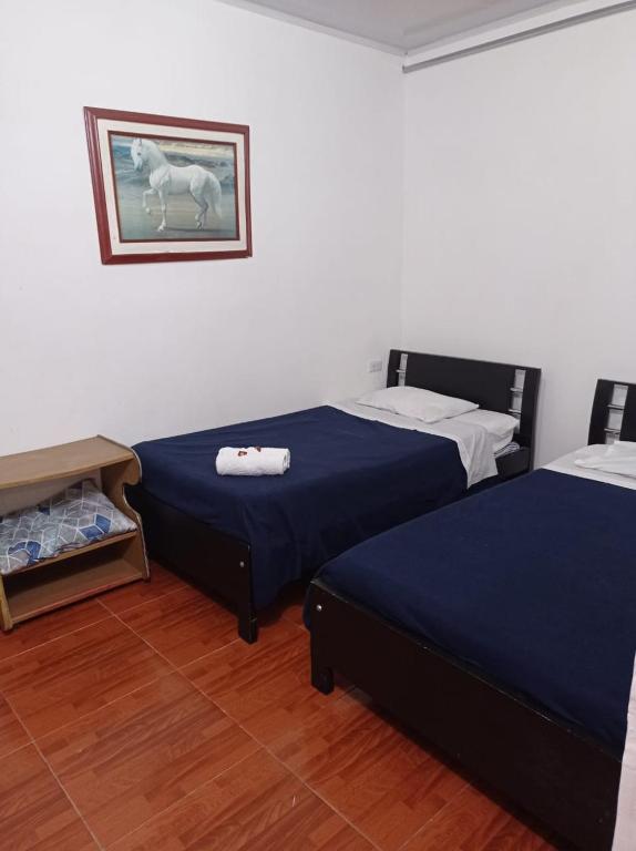 Cama o camas de una habitación en Bonsai Hotel Salamina Caldas