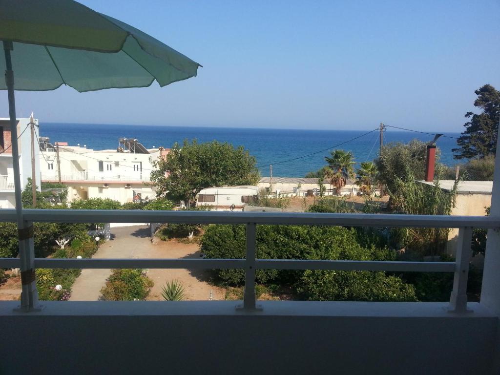 a view of the ocean from a balcony at Antouan Matina in Archangelos