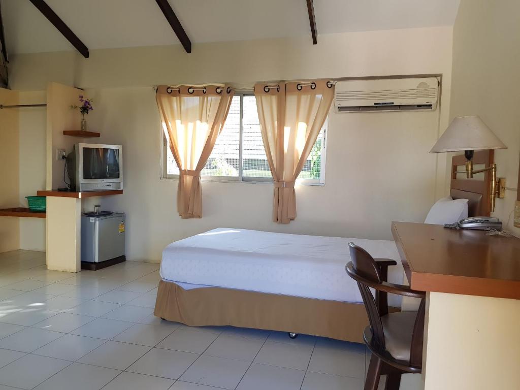 Postel nebo postele na pokoji v ubytování Casa Holiday Hotel SHA