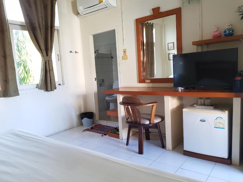 TV a/nebo společenská místnost v ubytování Casa Holiday Hotel SHA