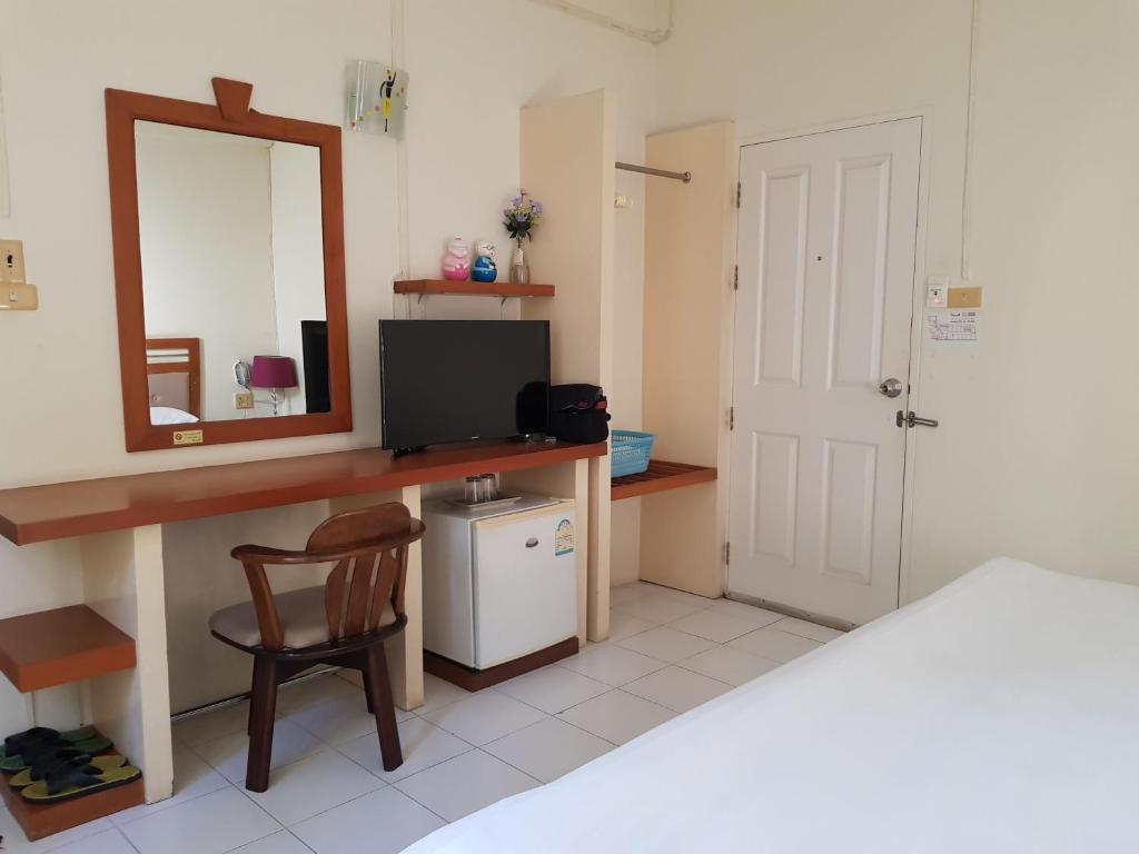 TV a/nebo společenská místnost v ubytování Casa Holiday Hotel SHA