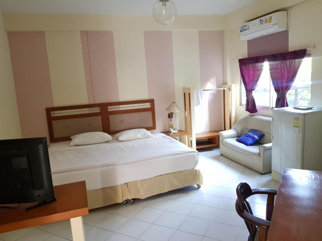 Postel nebo postele na pokoji v ubytování Casa Holiday Hotel SHA