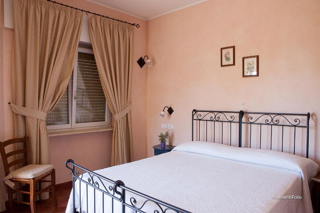 Albergo del Lagoにあるベッド