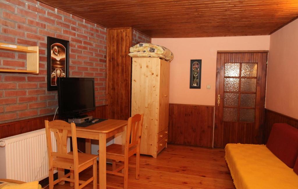 TV a/nebo společenská místnost v ubytování Penzion Uno