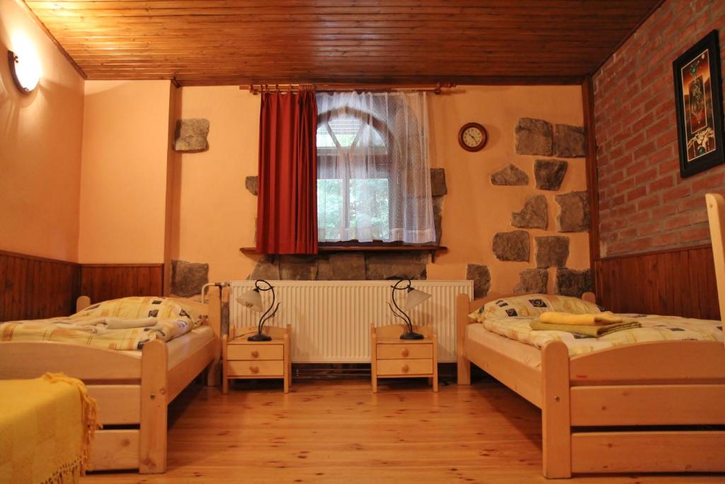 Postel nebo postele na pokoji v ubytování Penzion Uno