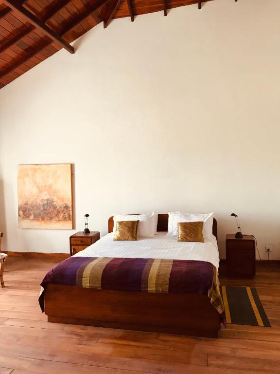 Postel nebo postele na pokoji v ubytování Spice of Ceylon