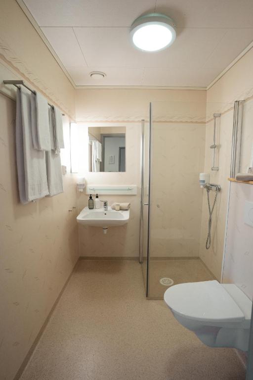 Koupelna v ubytování Bjugn Hotell