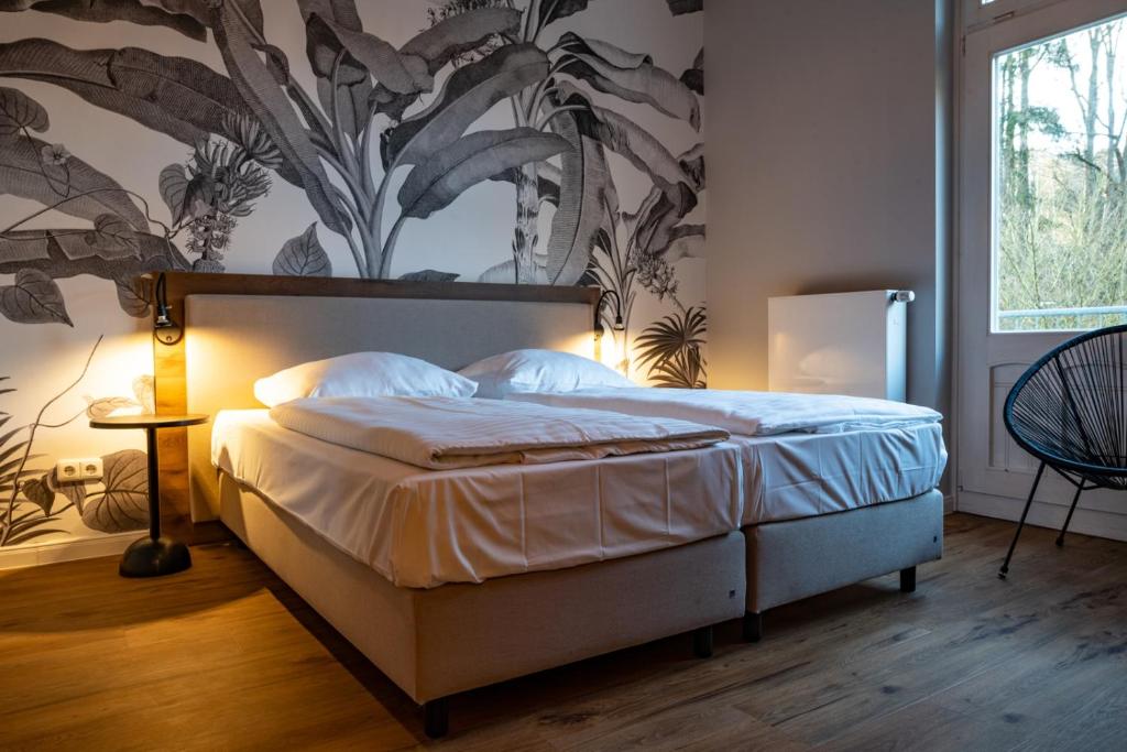 Postel nebo postele na pokoji v ubytování Wellnesshotel Waldquartier GmbH