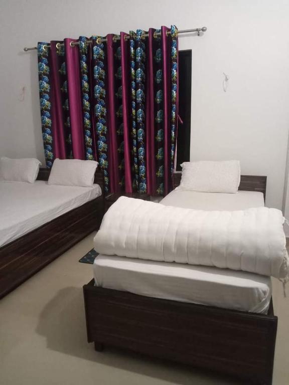 Postel nebo postele na pokoji v ubytování Hotel Kanthak