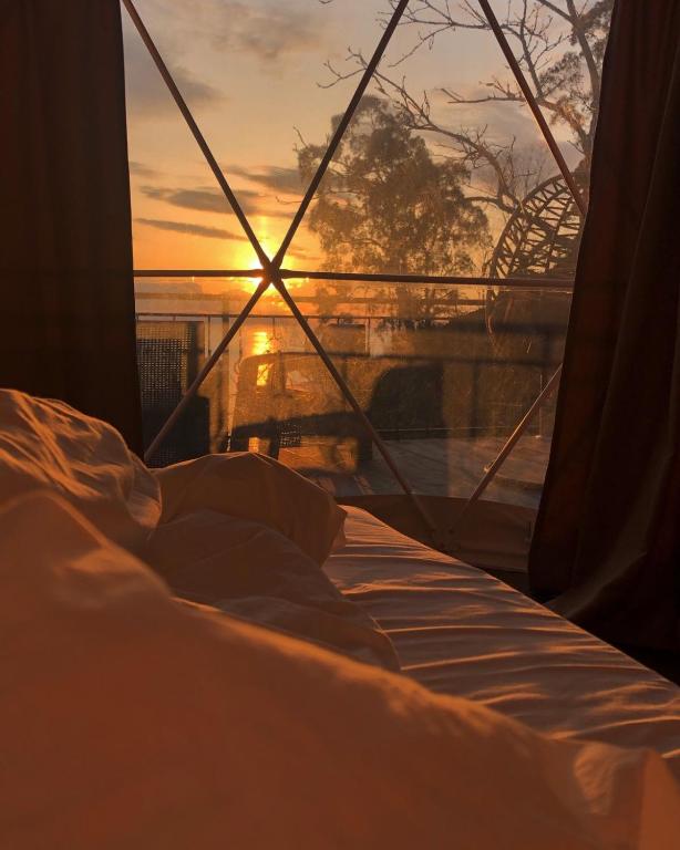 Postel nebo postele na pokoji v ubytování Glamping Village