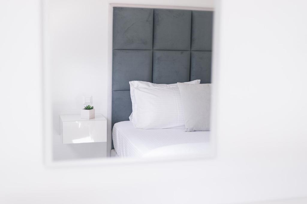 Posteľ alebo postele v izbe v ubytovaní A Luxury Retreat in Corfu Town by Konnect