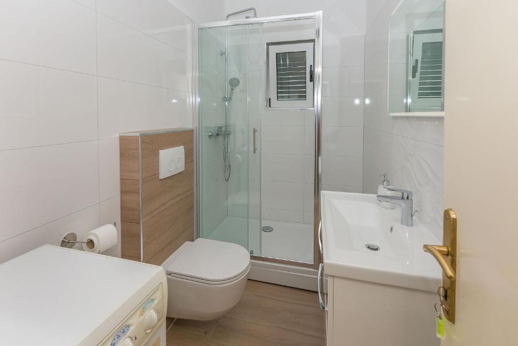 Kúpeľňa v ubytovaní Apartments Jasna