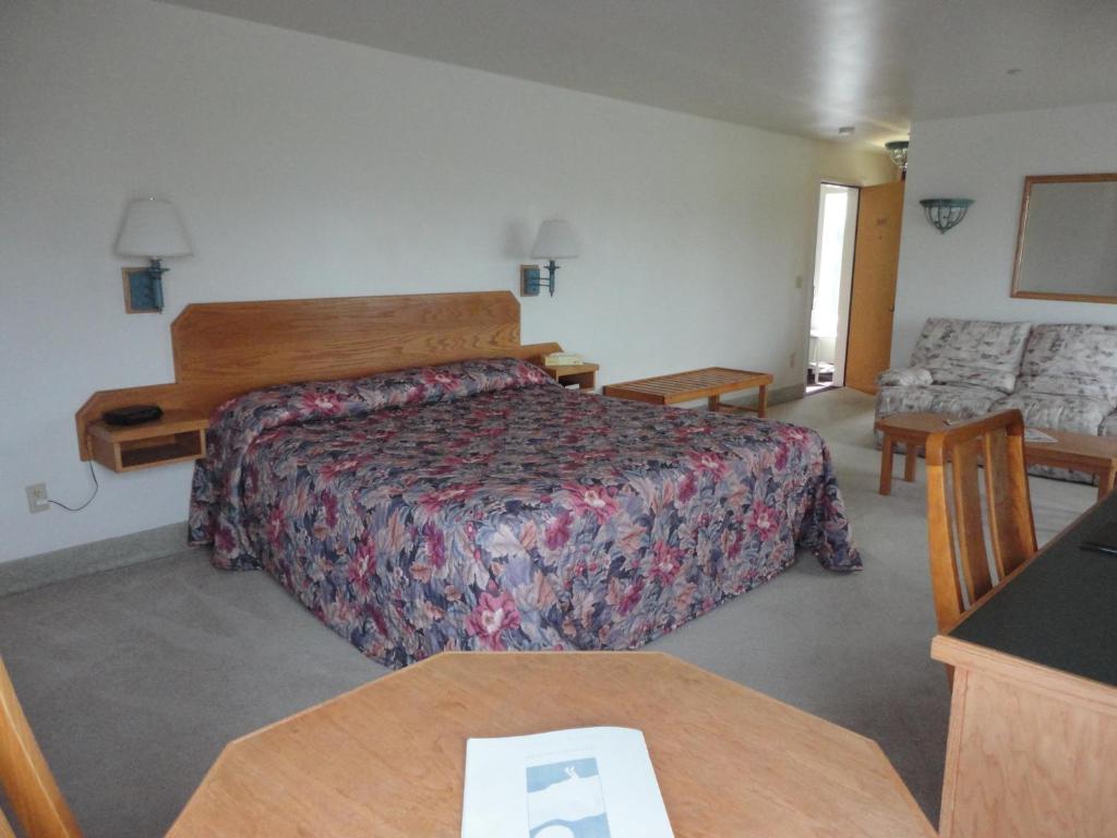 Postel nebo postele na pokoji v ubytování Island Resort