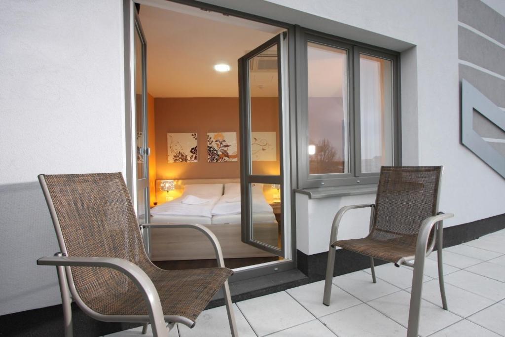 Postel nebo postele na pokoji v ubytování Hotel Gól garni