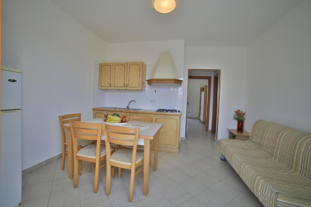 Kuchyň nebo kuchyňský kout v ubytování Residence Cala Verde
