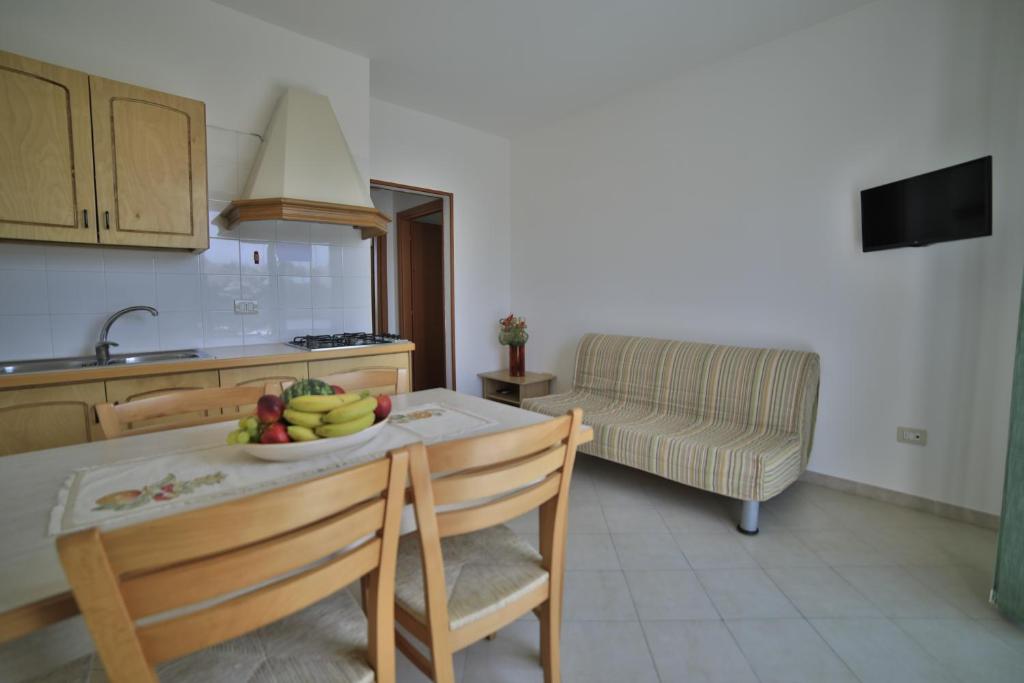 Kuchyň nebo kuchyňský kout v ubytování Residence Cala Verde