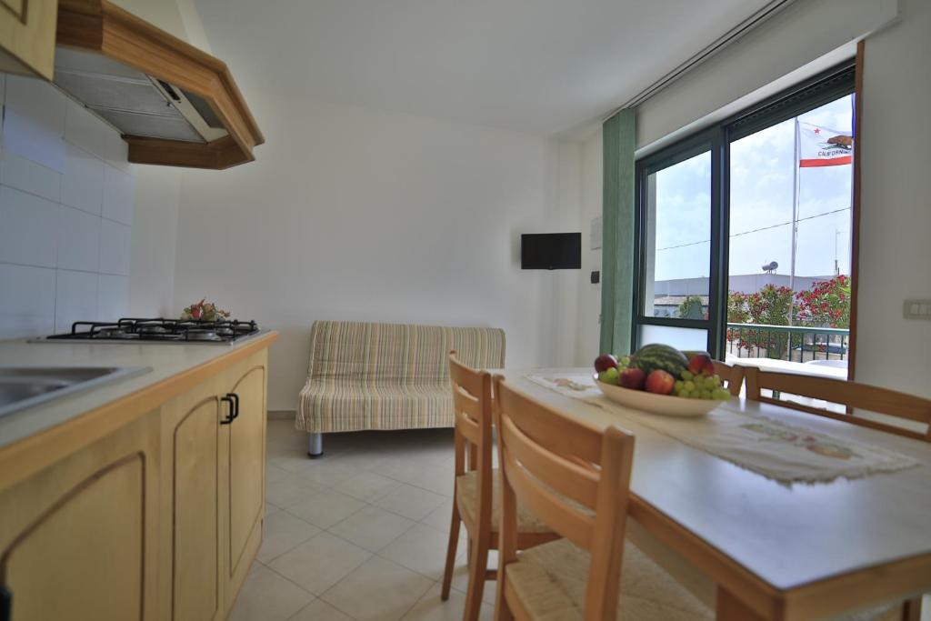 Kuchyň nebo kuchyňský kout v ubytování Residence Cala Verde