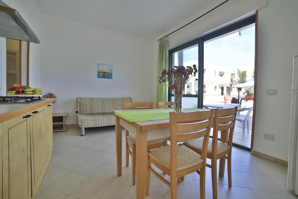 Kuchyň nebo kuchyňský kout v ubytování Residence Cala Verde
