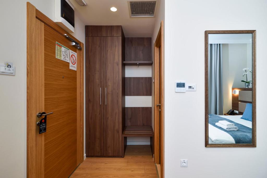 Krevet ili kreveti u jedinici u okviru objekta Hotel Opera Garni