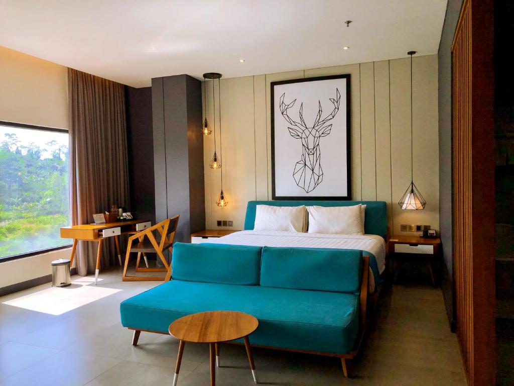 Posezení v ubytování Hotel Dafam Wonosobo