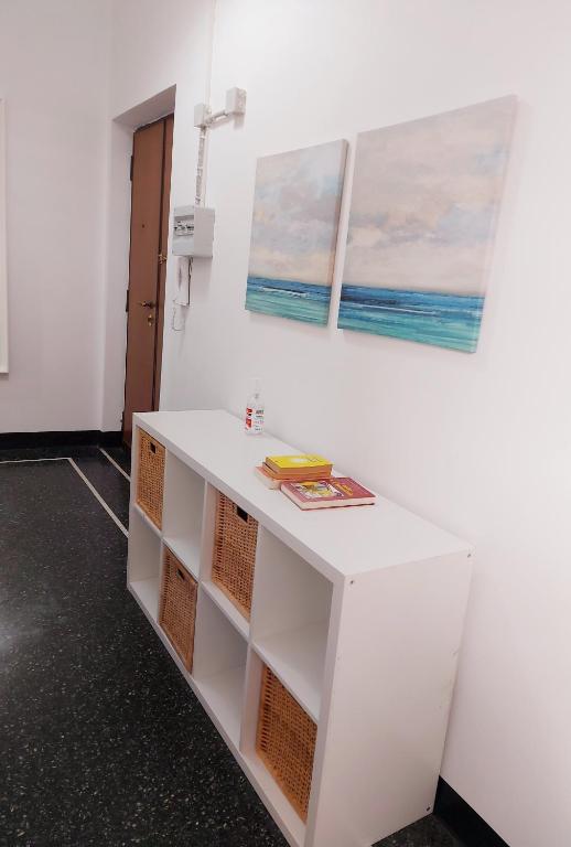 Fotografie z fotogalerie ubytování camera colombo 12 Genova Rooms v Janově