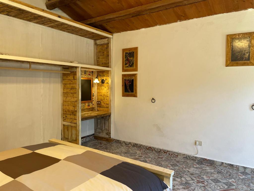 Postel nebo postele na pokoji v ubytování Casa Filù