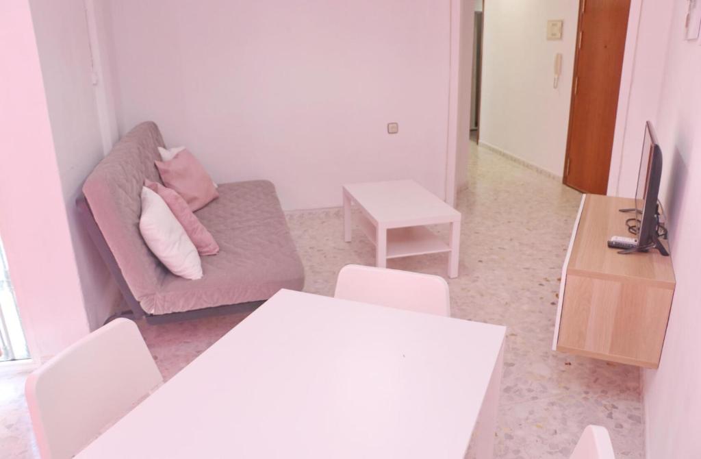 Televízia a/alebo spoločenská miestnosť v ubytovaní Apartamento en el centro