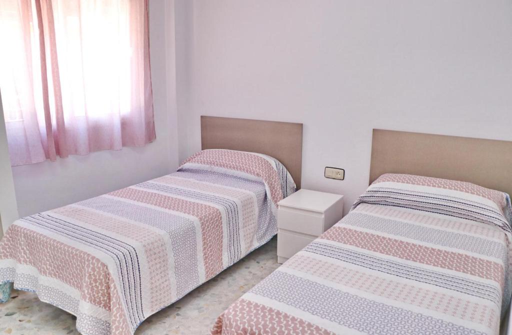 Posteľ alebo postele v izbe v ubytovaní Apartamento en el centro