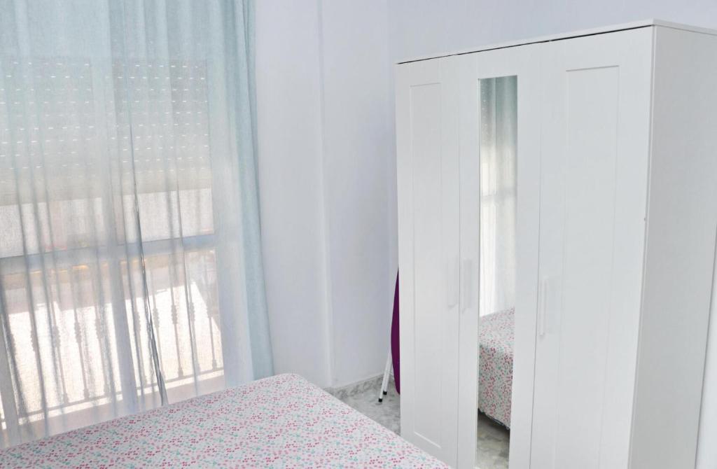 Posteľ alebo postele v izbe v ubytovaní Apartamento en el centro