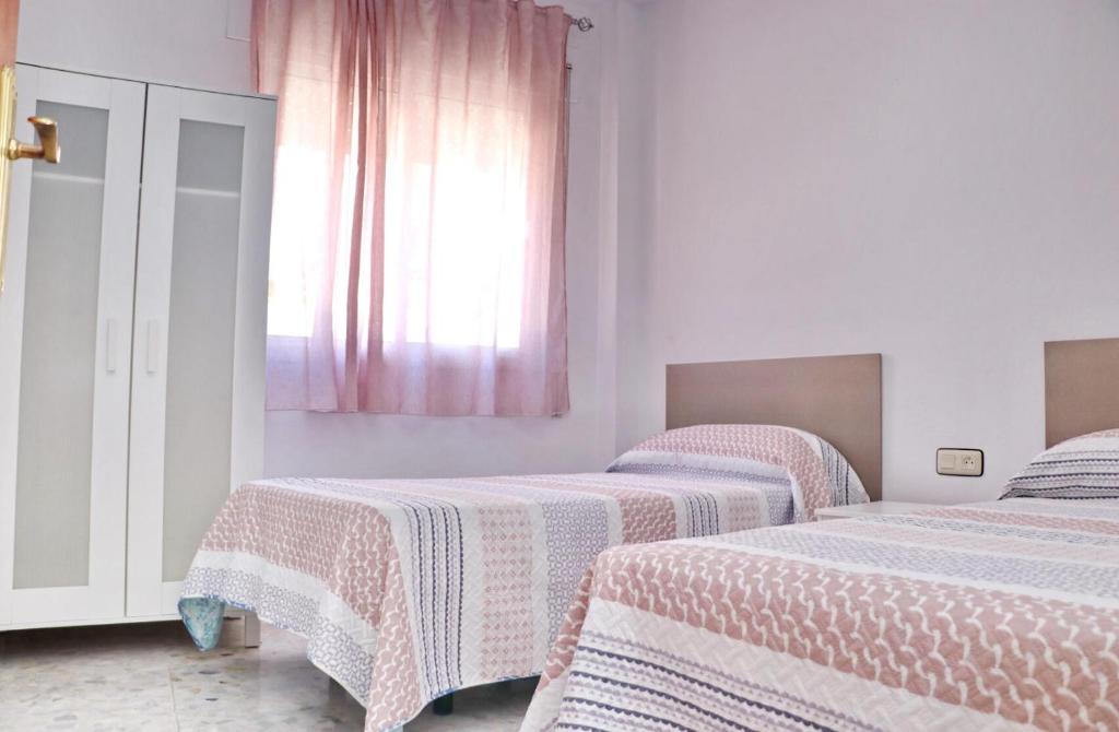 Posteľ alebo postele v izbe v ubytovaní Apartamento en el centro