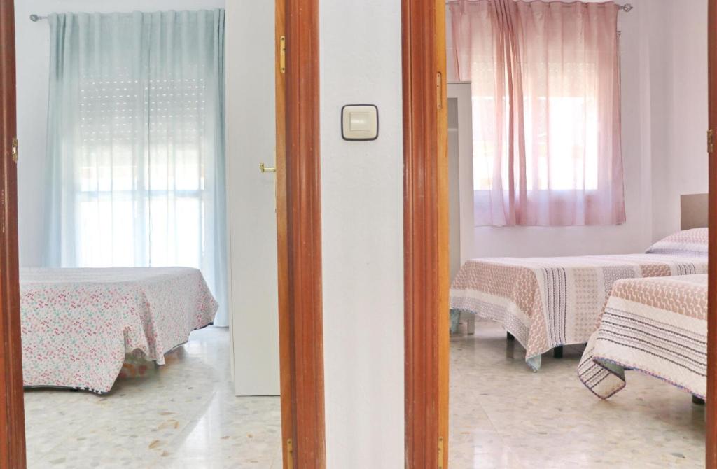 Posteľ alebo postele v izbe v ubytovaní Apartamento en el centro