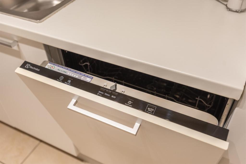 A kitchen or kitchenette at GARDA SAILS, Relax + Thermae
