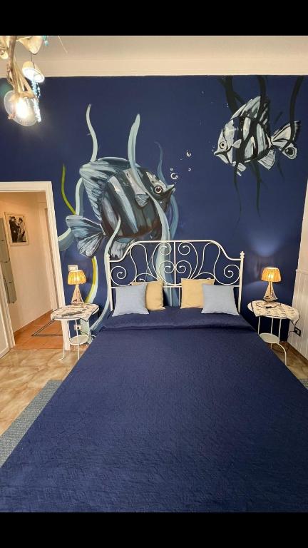 Postel nebo postele na pokoji v ubytování Holiday Rooms Ninfa