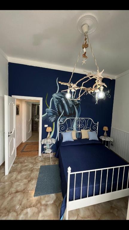 Postel nebo postele na pokoji v ubytování Holiday Rooms Ninfa