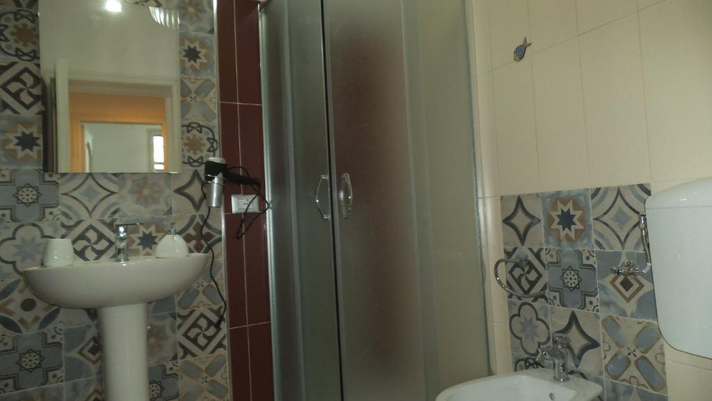Koupelna v ubytování Holiday Rooms Ninfa