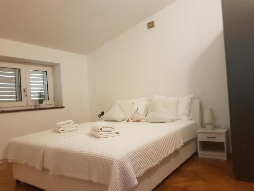 Posteľ alebo postele v izbe v ubytovaní Barun apartments Kastela