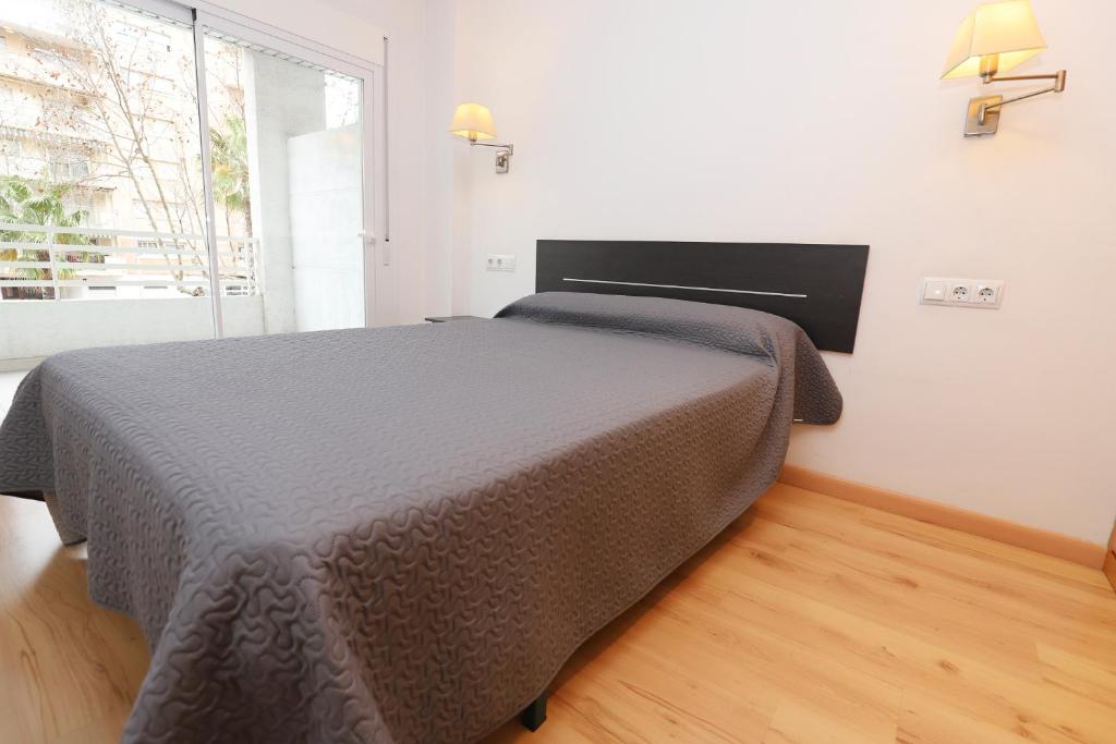 Posteľ alebo postele v izbe v ubytovaní COSTA DAURADA APARTAMENTS - Royal 104 Luxe