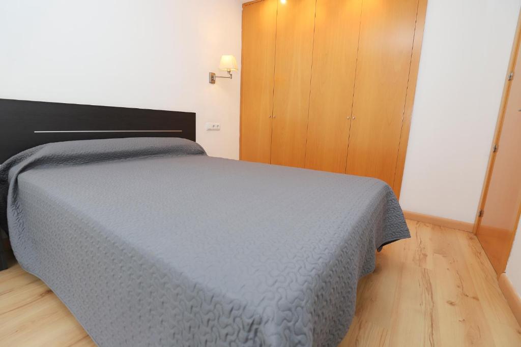 Posteľ alebo postele v izbe v ubytovaní COSTA DAURADA APARTAMENTS - Royal 104 Luxe