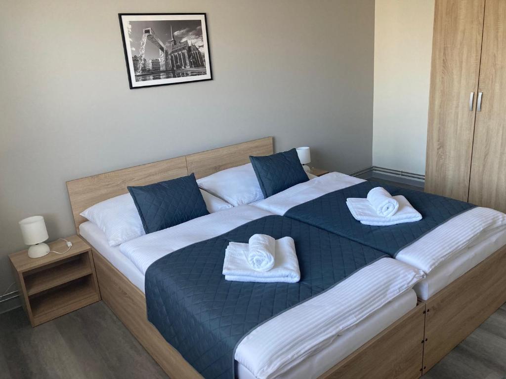 Postel nebo postele na pokoji v ubytování Hotel Prokopávka