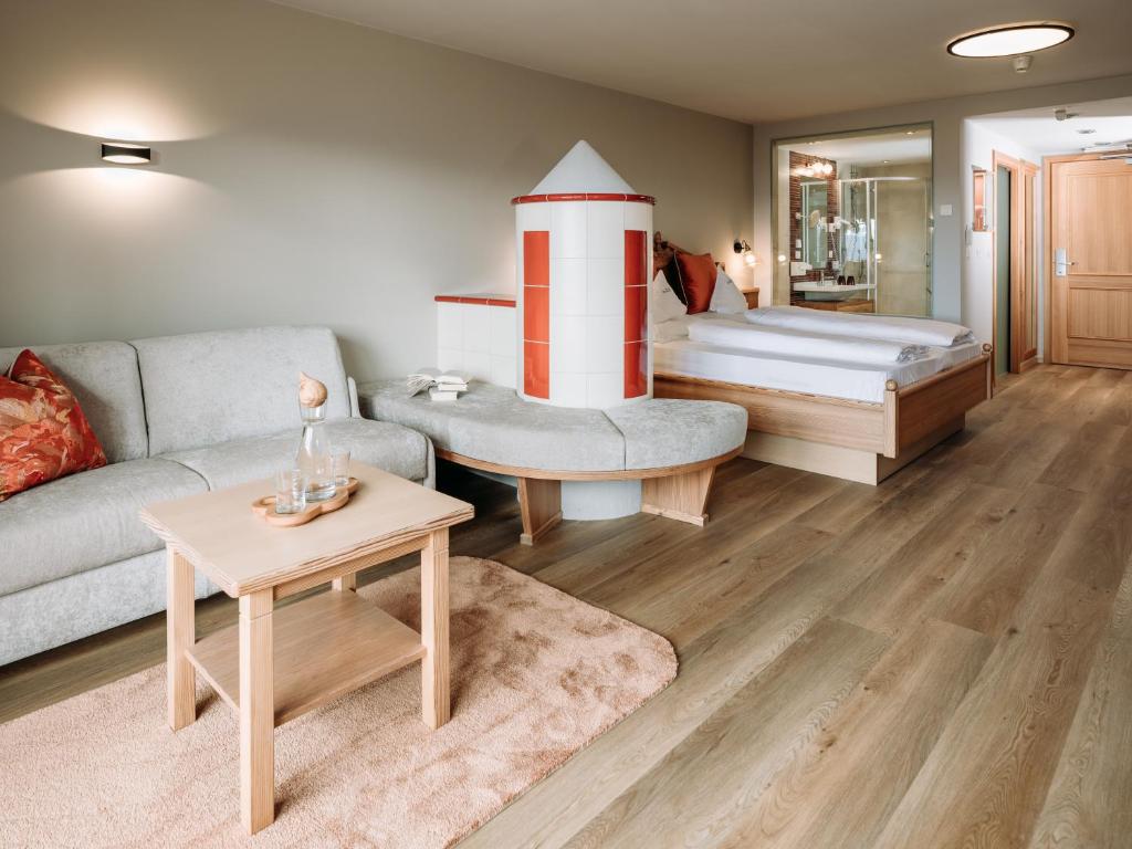 Postel nebo postele na pokoji v ubytování Hotel Bacherhof