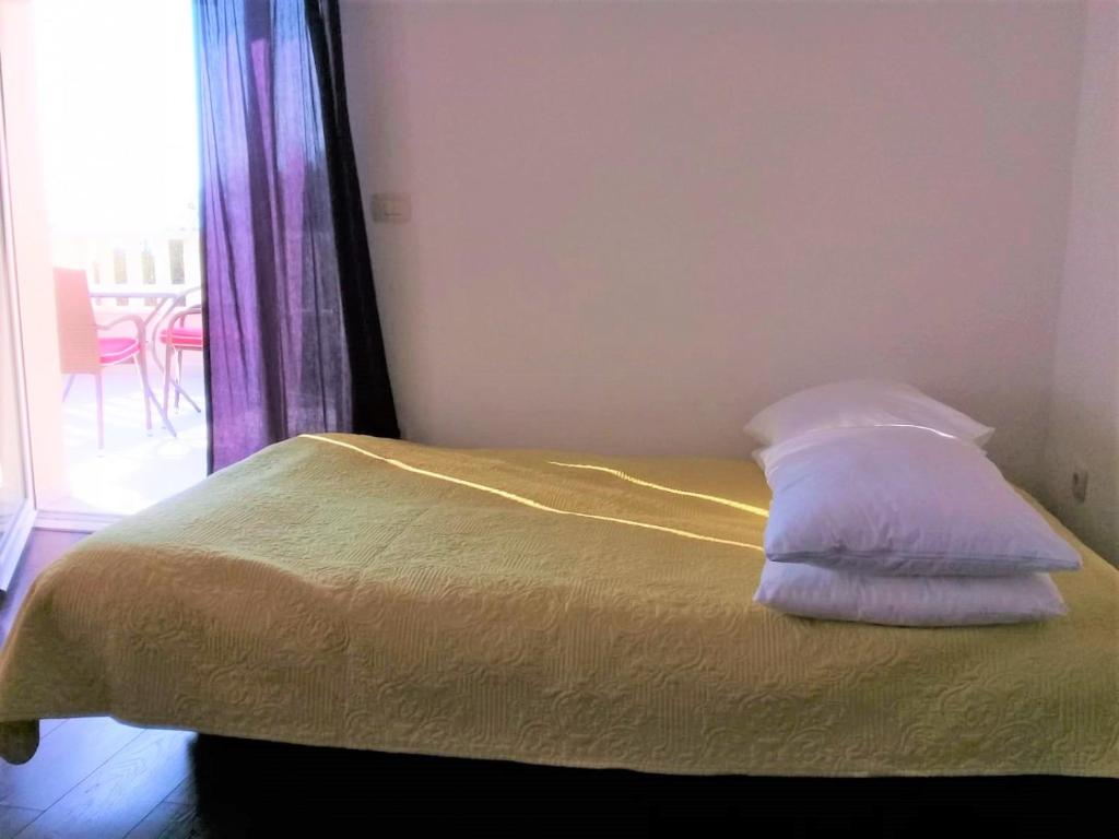 Postel nebo postele na pokoji v ubytování Studio Apartment Brela