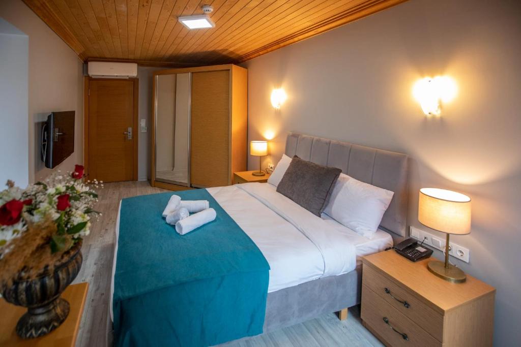 Postel nebo postele na pokoji v ubytování TAXIM 34 Hotel İstanbul