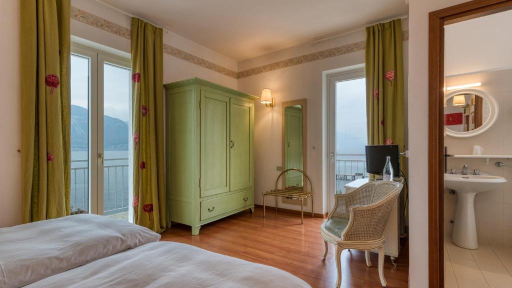 Postel nebo postele na pokoji v ubytování La Caletta Hotel Bolognese
