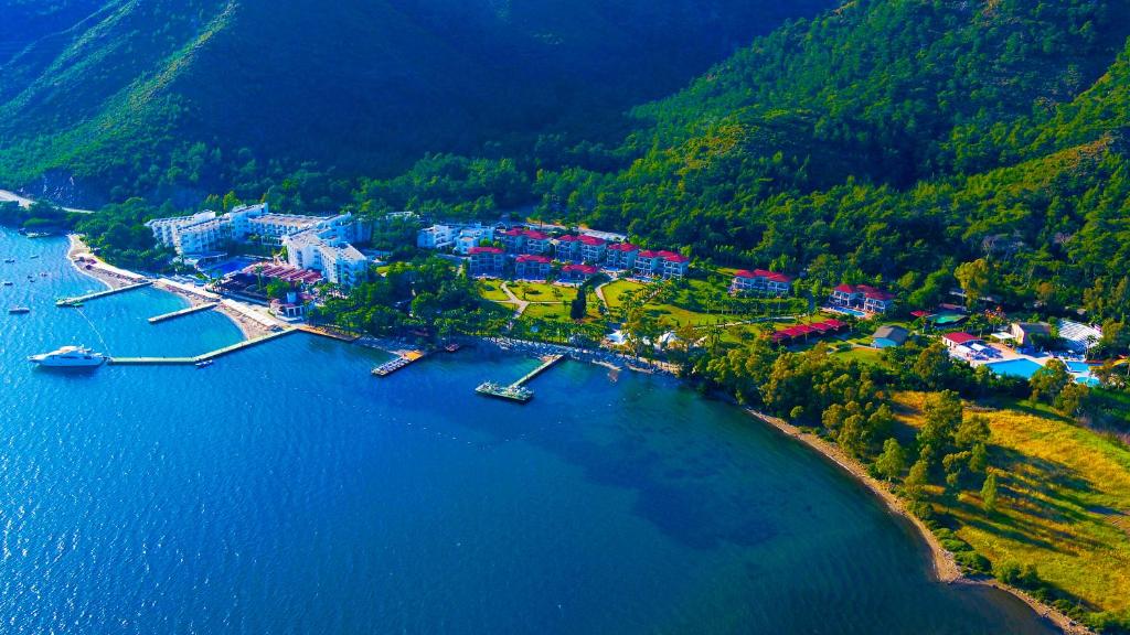 an aerial view of a resort on a lake at Fortezza Beach Resort in Hisarönü