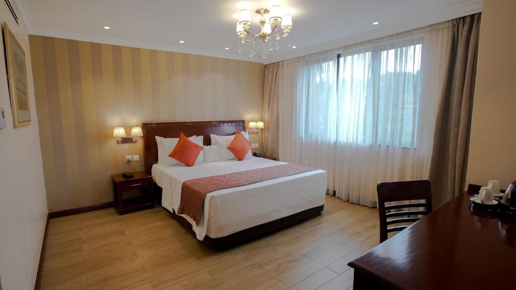 Postel nebo postele na pokoji v ubytování Sarova Woodlands Hotel and Spa