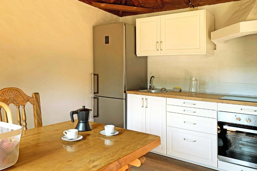 Kuchyň nebo kuchyňský kout v ubytování Casa El Colmenero