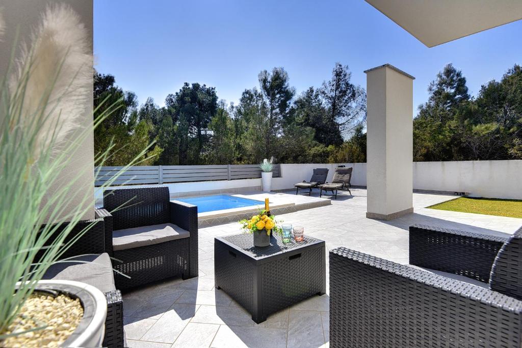 Posedenie v ubytovaní Villa Residence Oli B