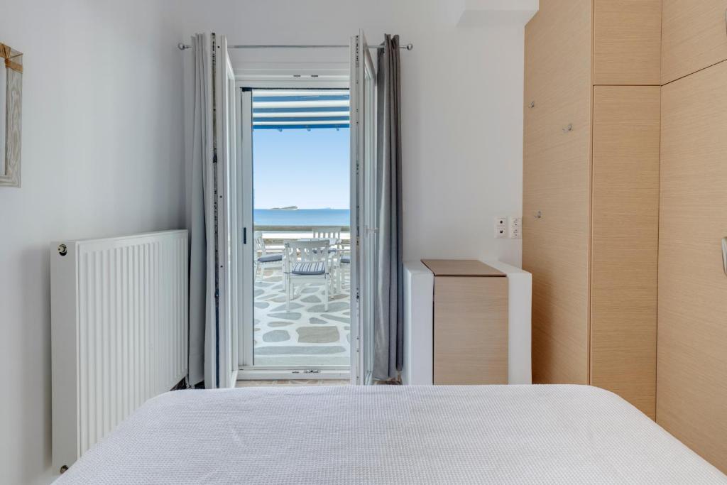 Postel nebo postele na pokoji v ubytování Endless Blue from Syros - Fabrika Resort - House 1
