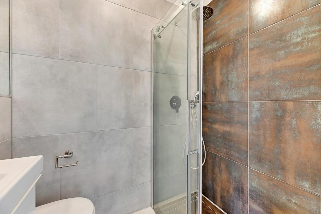 Kúpeľňa v ubytovaní Szeroka Boutique by Downtown Apartments