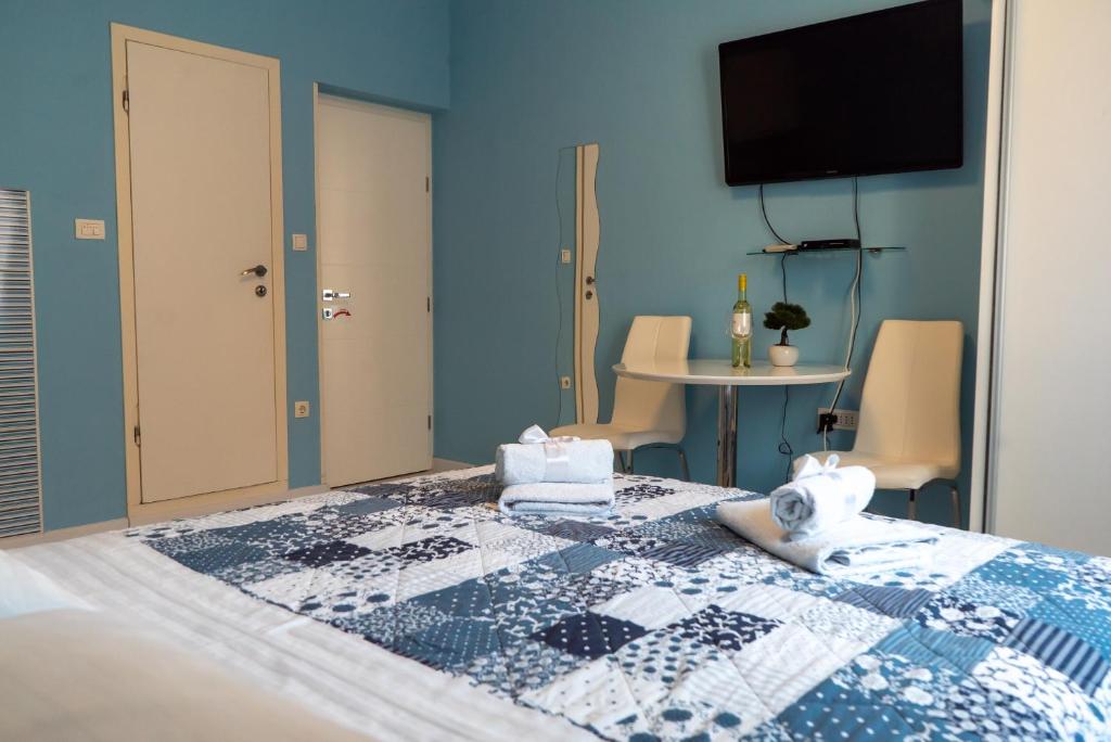 Postel nebo postele na pokoji v ubytování Apartments & Rooms Andrea 2